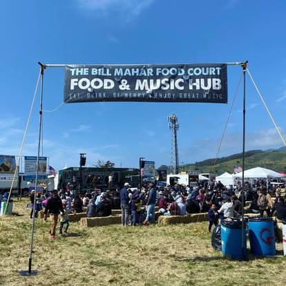 Vintage music band performing on a festival stage at Pacific Coast Dream Machines event in Half Moon Bay, California