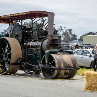 Vintage tractor on display at Pacific Coast Dream Machines event in Half Moon Bay, California.