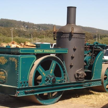 Vintage locomotive on tracks at Pacific Coast Dream Machines event in Half Moon Bay, California.
