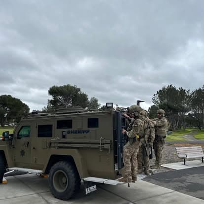 Vintage military armored truck on display at Pacific Coast Dream Machines event in Half Moon Bay, CA.