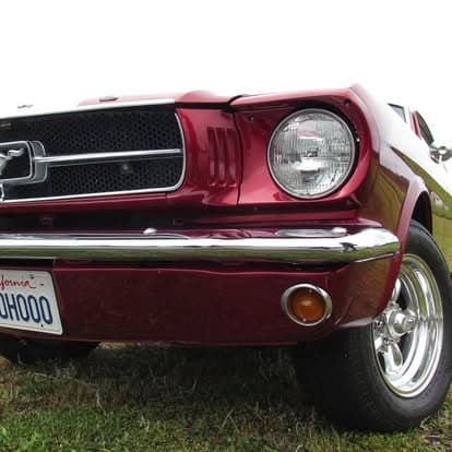 Classic cars on display at the Pacific Coast Dream Machines show at Half Moon Bay Airport